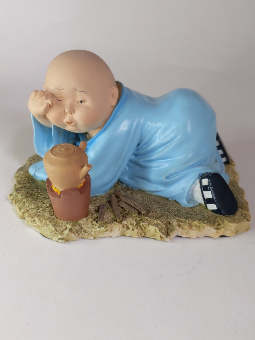 Blue Robed Ceramic Monk Figurine with Teapot